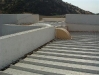 Hermetizar con malla techos de casas mediterráneas